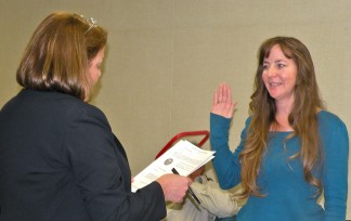 Vickie Mullen takes oath of office administered by former superintendent Katherine 'Katie' Kleier in December 2012.