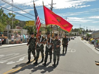 The Young Marines of Santa Clarita Valley present colors for the 45th Annual Fiesta Days Parade Saturday, Aug. 2...at the 46th Annual Fiesta Days marathon party and reunion. that continues through Sunday.. [photo by Patric Hedlund]