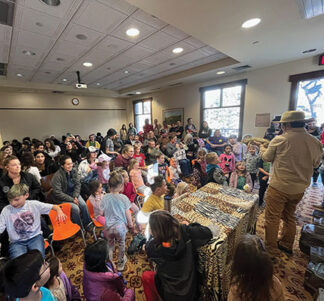 The community room at the library in Frazier Park filled with kids and parents for a presentation by Mobile Zoo of Southern California. The kids went...wild.